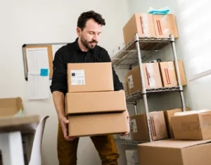 Commercial movers handling boxes during a business relocation in Auckland